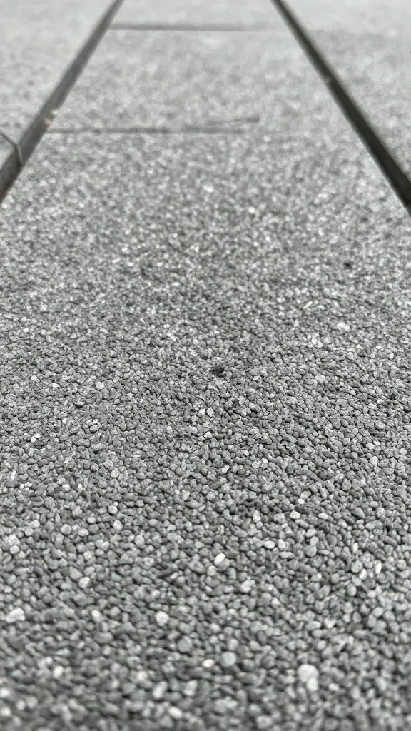 macro shot of pea gravel texture underfoot on a finished patio